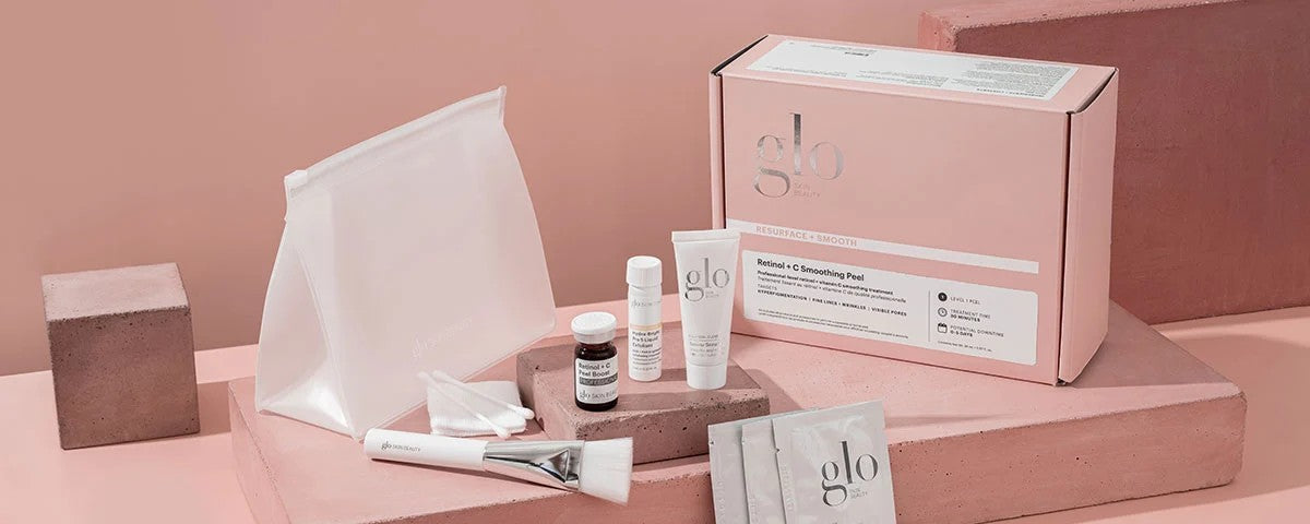 Pink glo kit: Retinol + C Smoothing Peel box and tubes with brush, cotton pads, and clear pouch — RESURFACE + SMOOTH