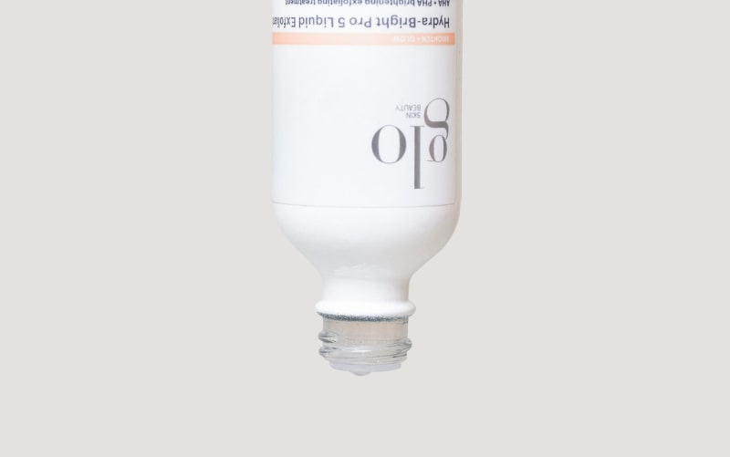 Upside-down bottle, open neck: glo SKIN BEAUTY Hydra-bright Pro 5 Liquid Exfoliant