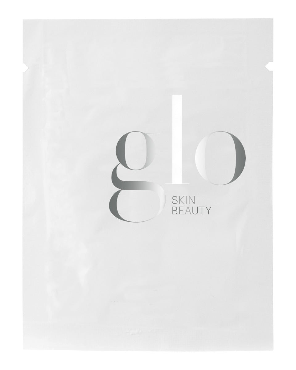 White sample sachet labeled 'glo SKIN BEAUTY' for Phyto-Active Cream Cleanser