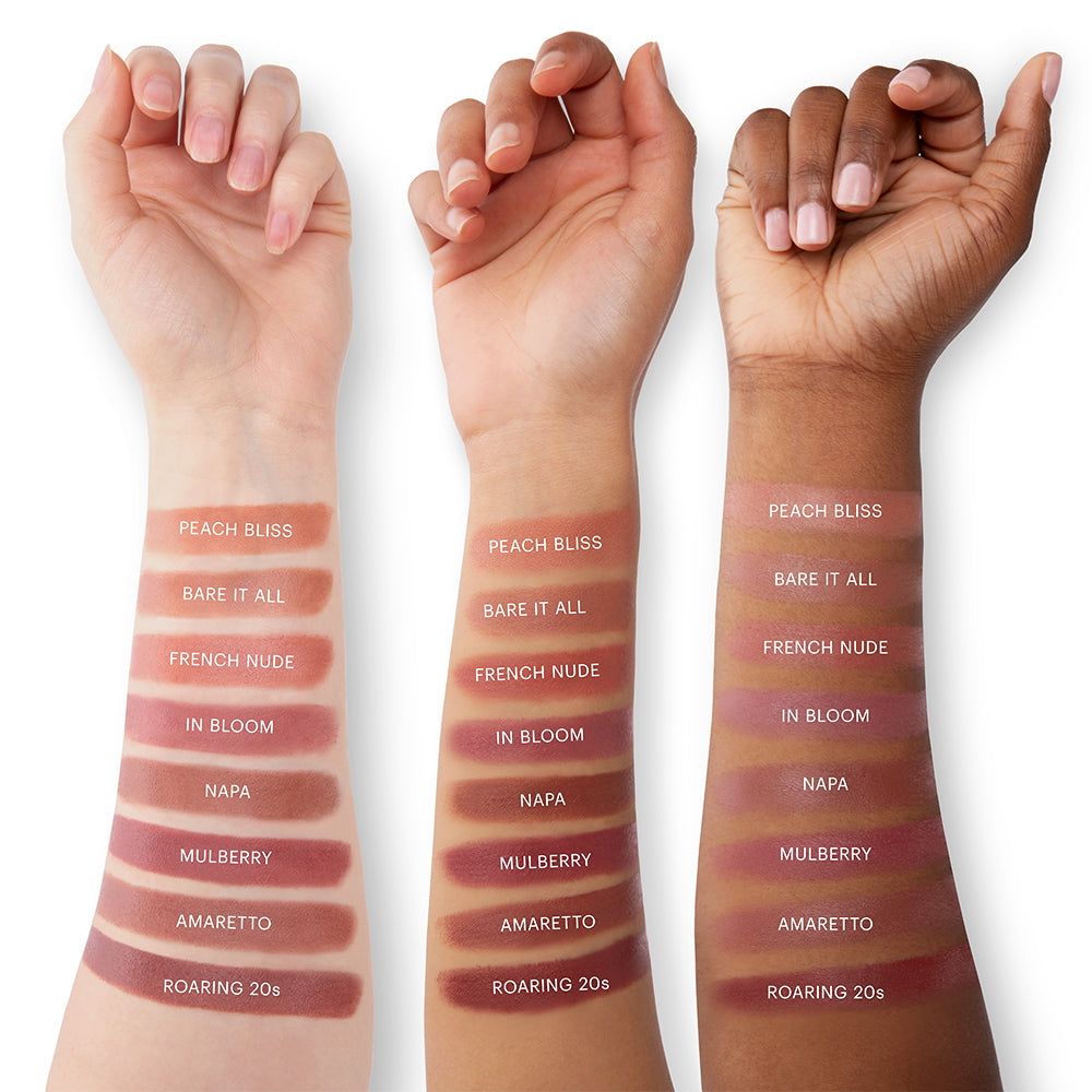 Three arms showing swatches labeled: PEACH BLISS, BARE IT ALL, FRENCH NUDE, IN BLOOM, NAPA, MULBERRY, AMARETTO, ROARING 20s