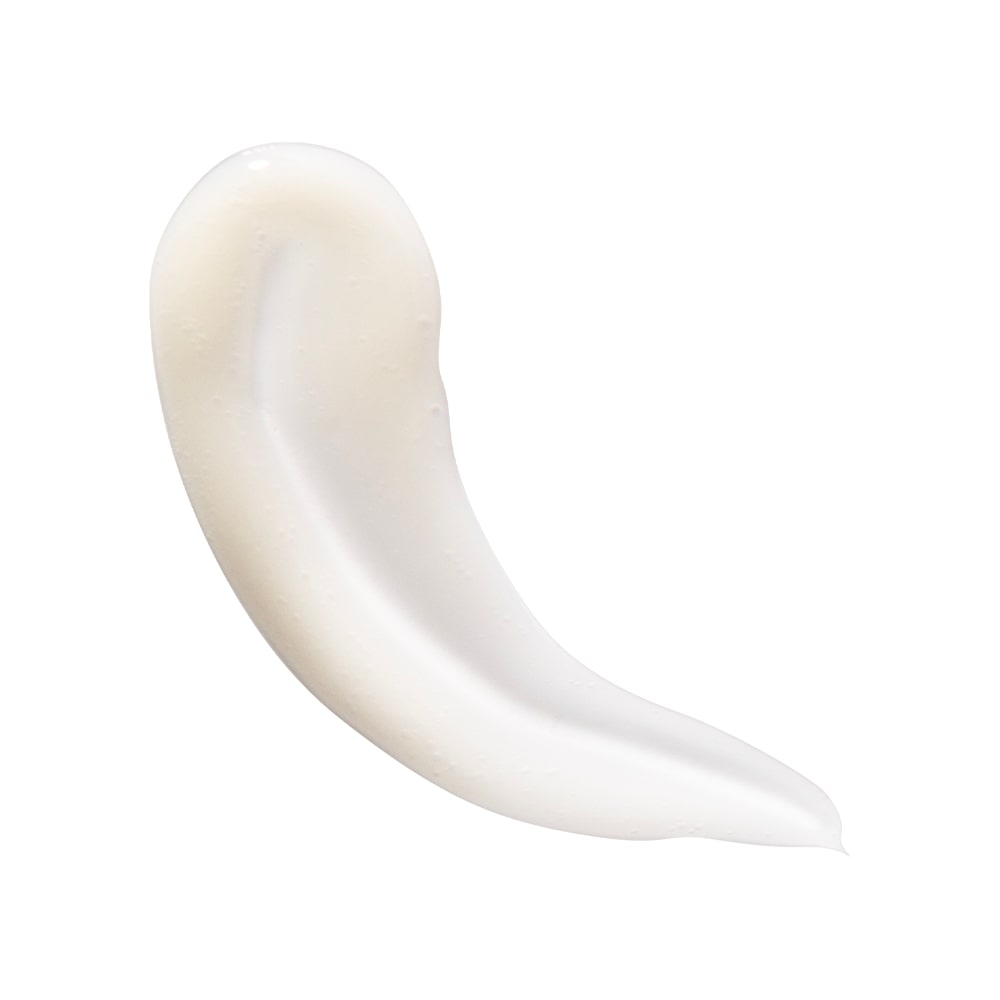 Smear of white lotion on a white background