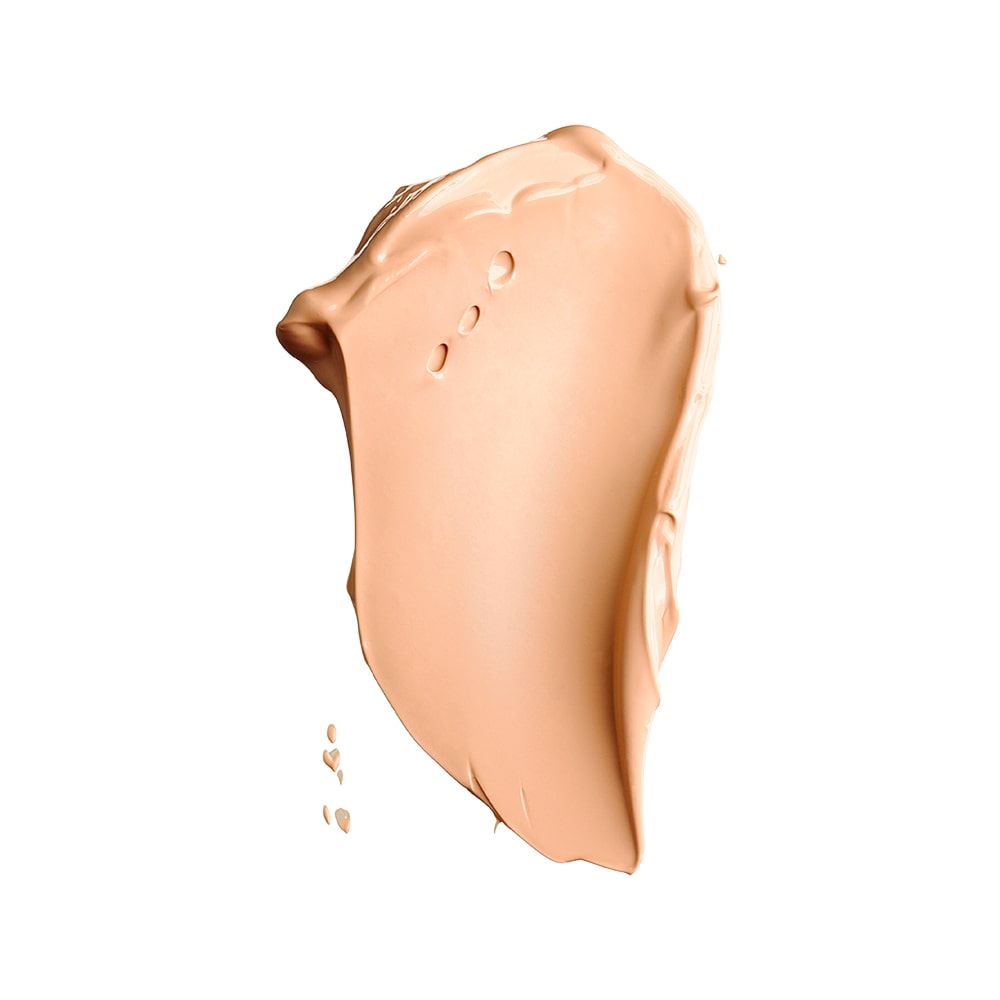 Peach-beige foundation smear showing smooth, creamy texture and medium coverage