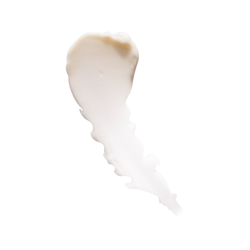 Creamy beige skincare lotion smear with tapered, brushstroke edges on white background.
