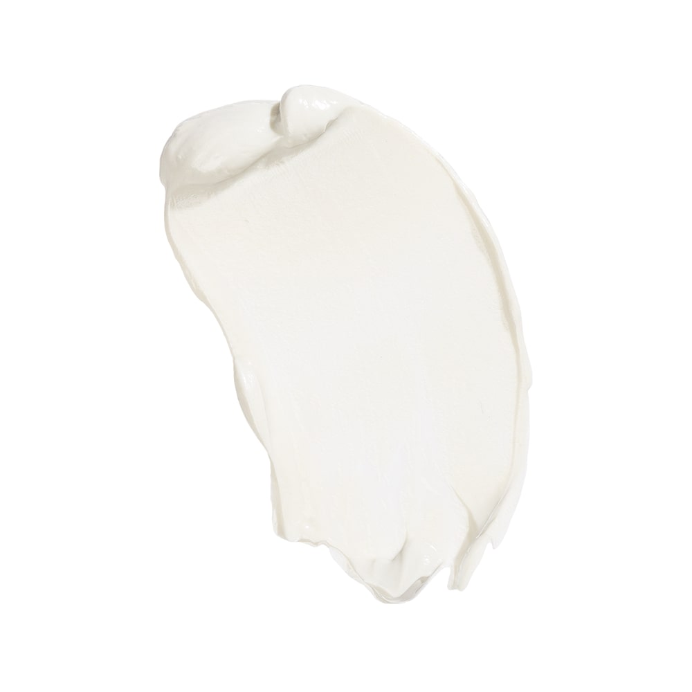 Smear of white restorative mask cream texture