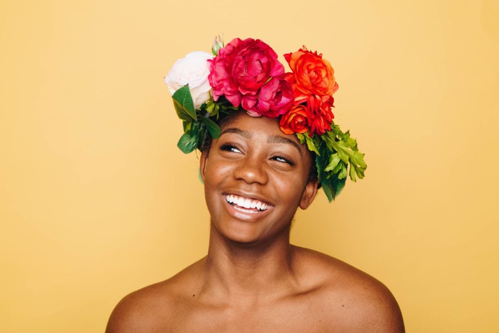 woman smiling with flower headband