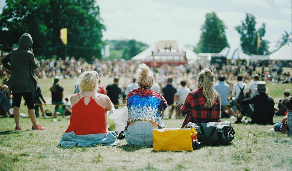 woman sitting in a field