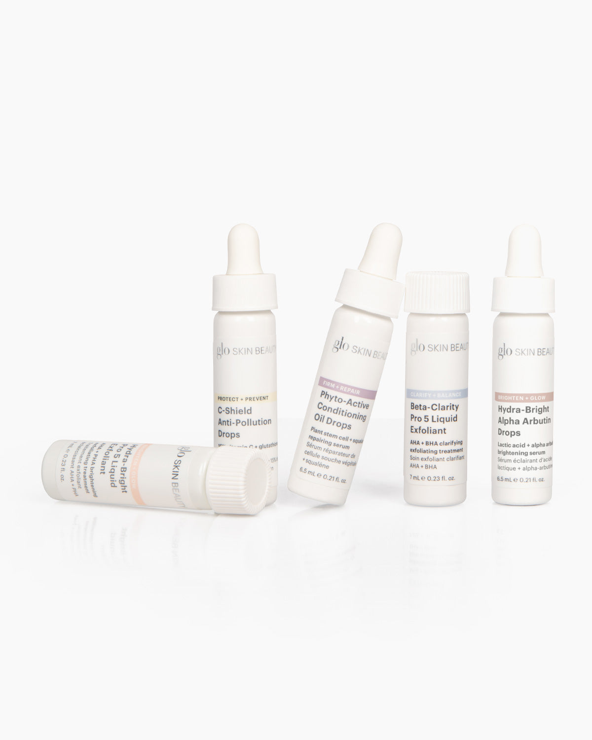 Glo Skin Beauty mini skincare drops set featuring C-Shield, Phyto-Active, Beta-Clarity, and Hydra-Bright formulas.