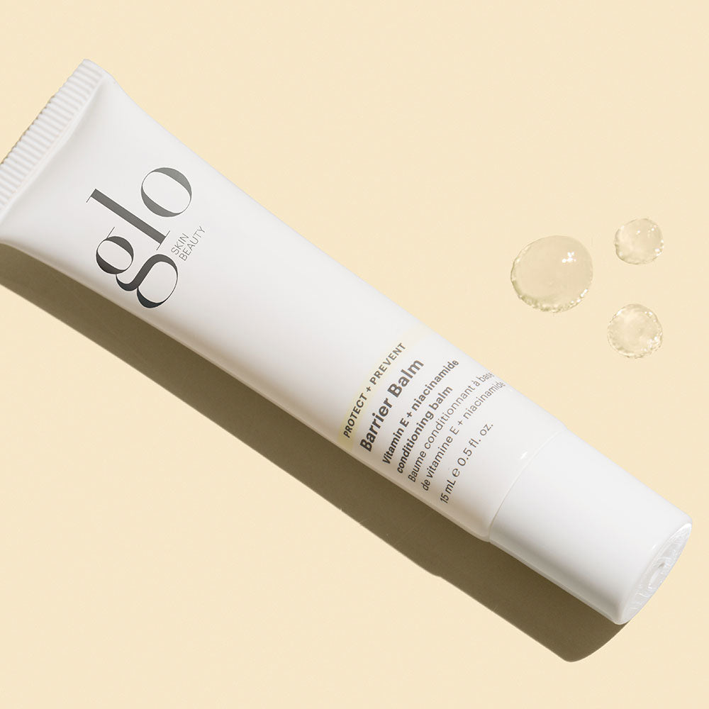 Glo Skin Beauty Barrier Balm tube with vitamin E + niacinamide conditioning balm text