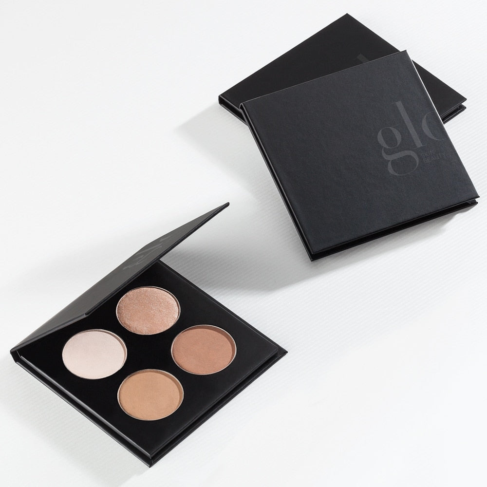 Makeup contour kit with four shades and 'glo' brand name on black cover