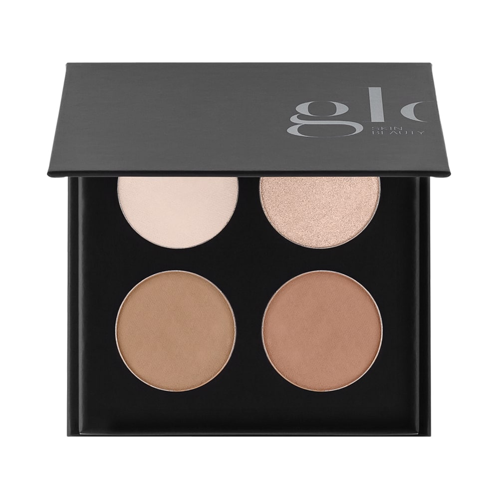 Makeup contour kit with four shades and partial 'glo skin beauty' text on black case