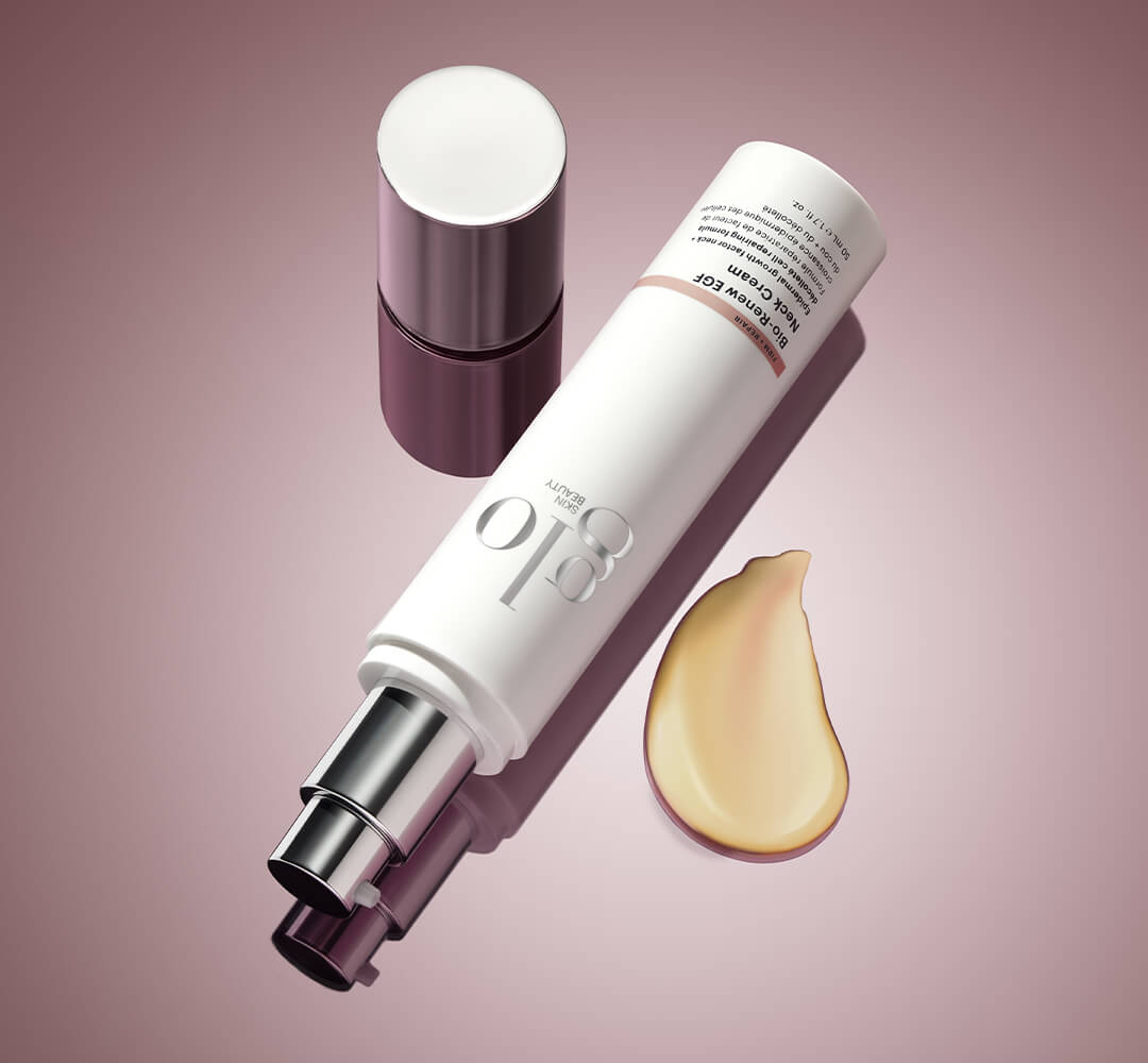 White pump tube labeled BIO-RENEW EGF Neck Cream and 010 SKIN BEAUTY on mauve background with a beige cream swatch.