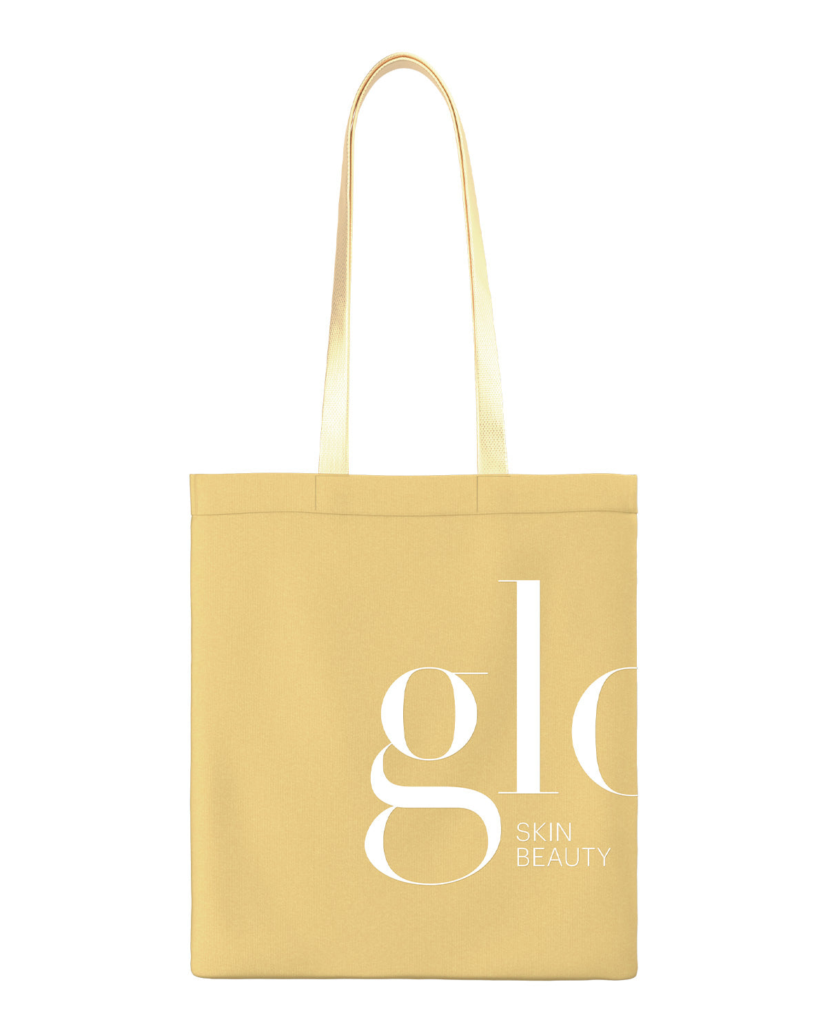 Gold canvas tote bag with white glo logo and SKIN BEAUTY text on lower-right.