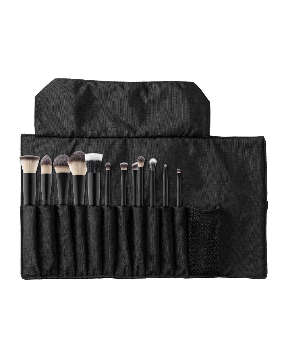 Set of 12 makeup brushes in a black fabric roll-up case