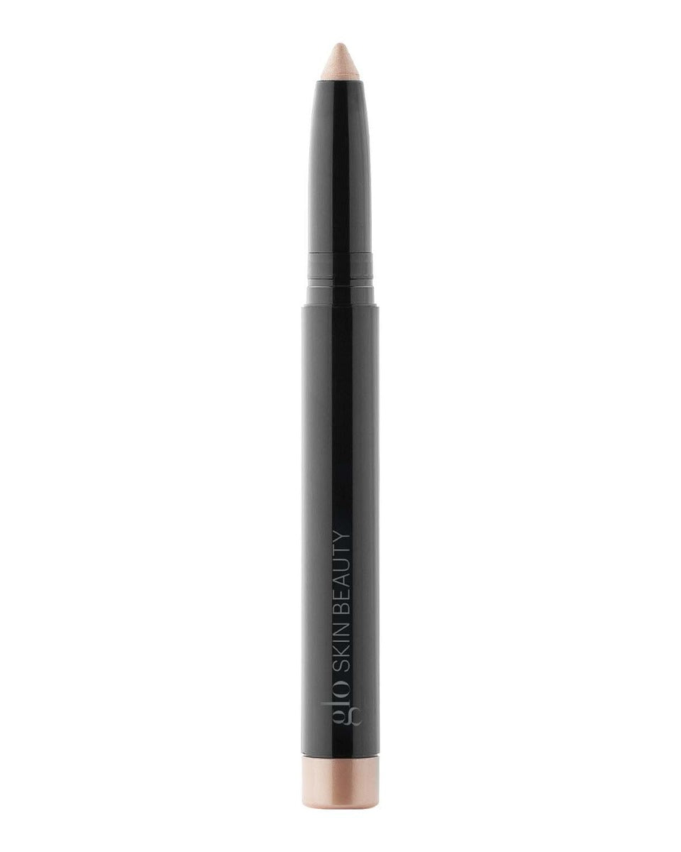 Front view of Cream Stay Shadow Stick in beige showcasing creamy twist-up tip and black barrel on white background