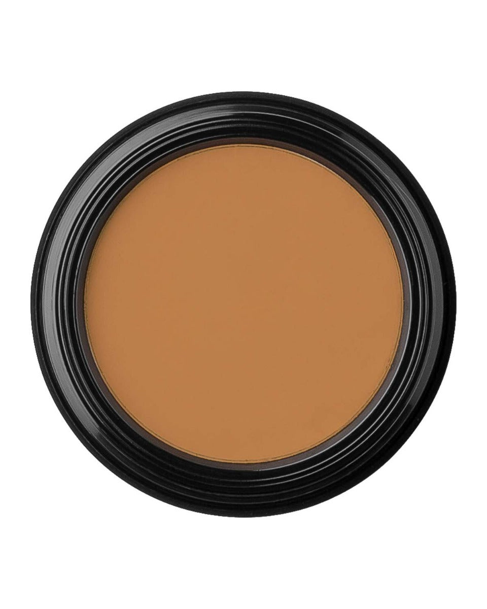 Camouflage cream makeup in a round black container, medium tan shade
