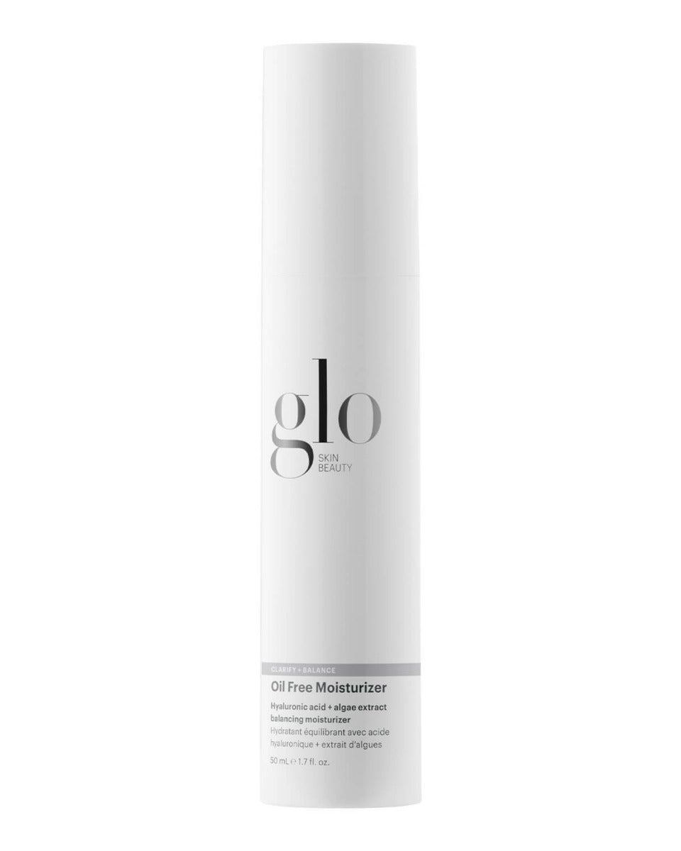 Tall white bottle with glo SKIN BEAUTY logo — Oil Free Moisturizer