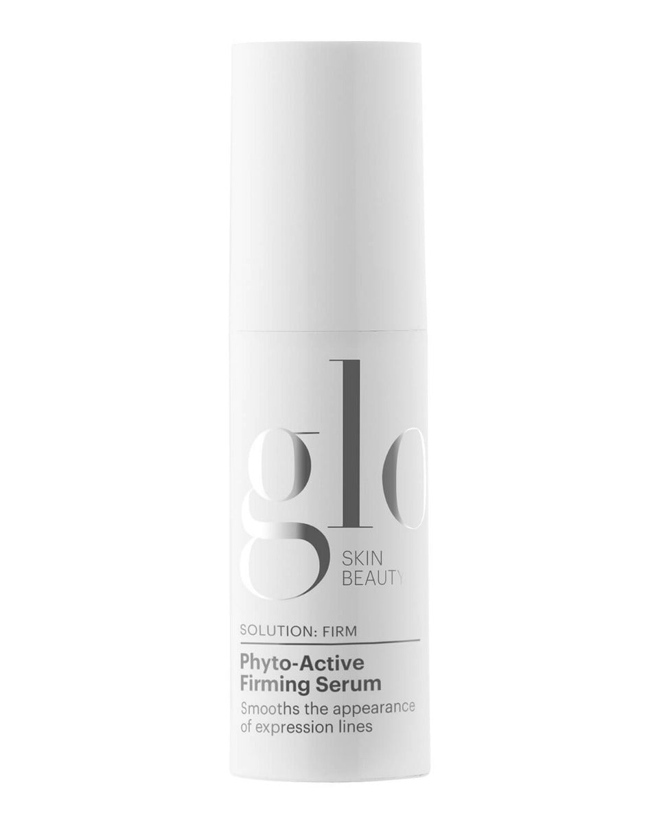 Product bottle labeled: glo SKIN BEAUTY SOLUTION: FIRM Phyto-Active Firming Serum Smooths the appearance of expression lines