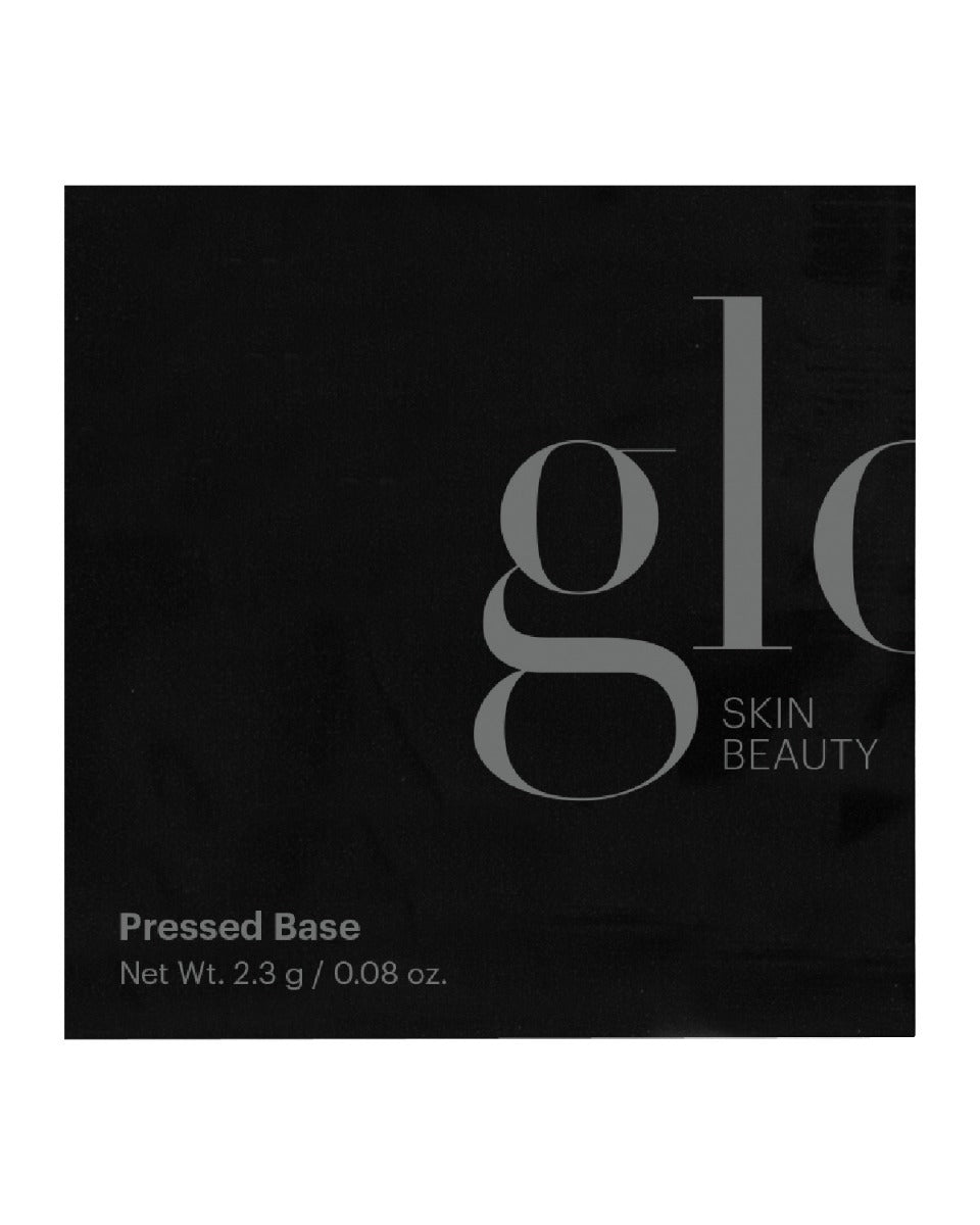 Glo Skin Beauty Pressed Base black compact packet with gray 'glo' logo and weight 2.3 g