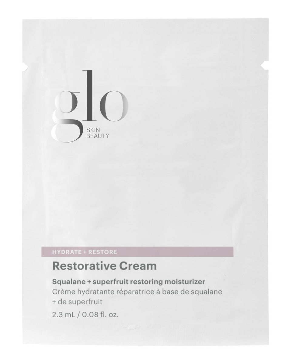 glo Skin Beauty restorative cream single-use packet labeled HYDRATE + RESTORE, squalane + superfruit.