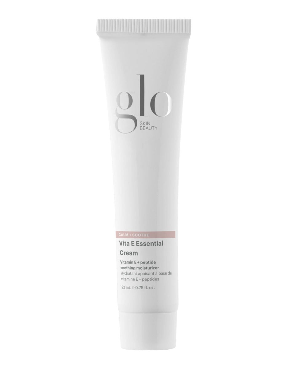 Front view of travel-size Vita E Essential Cream tube showcasing Glo logo and product label on white background