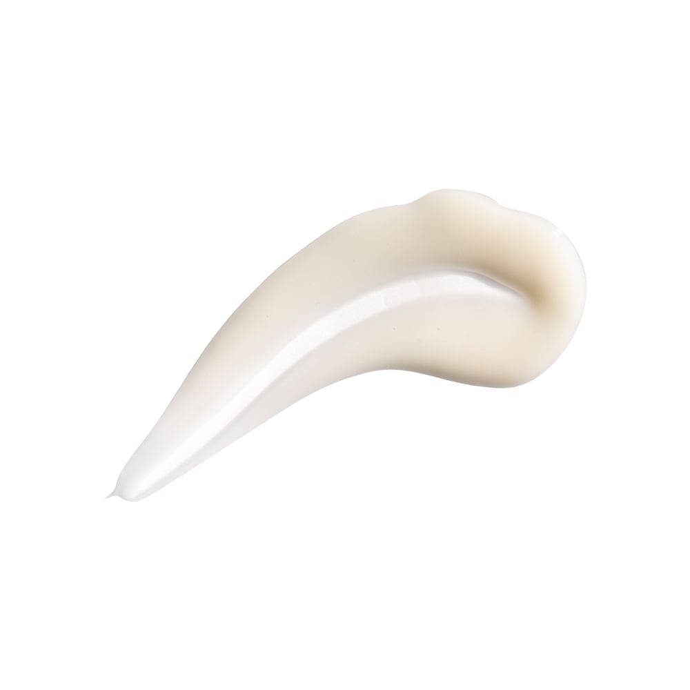 Beige creamy cleanser smear with glossy sheen on white background
