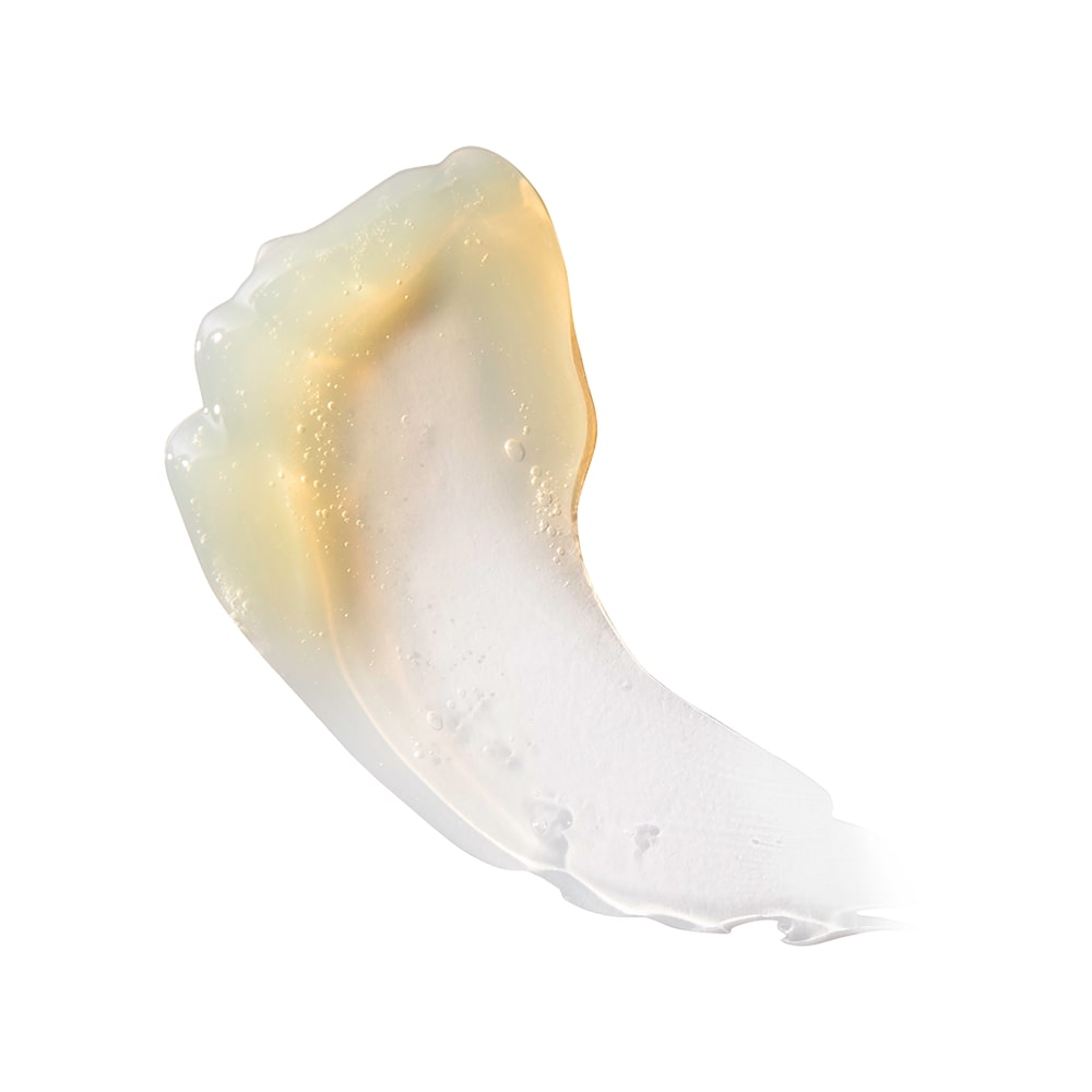 Translucent gel cleanser smear with golden sheen and small bubbles