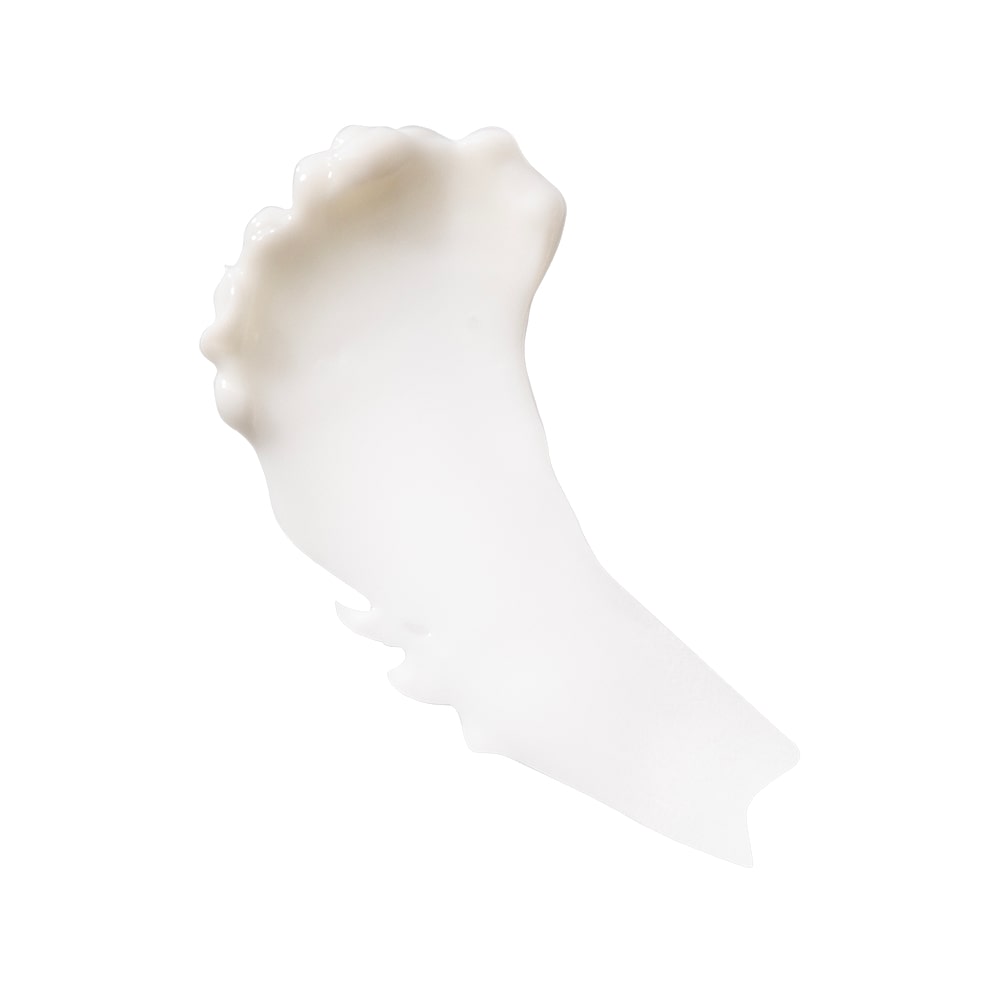 White creamy smear of moisturizing lotion showing texture and finish