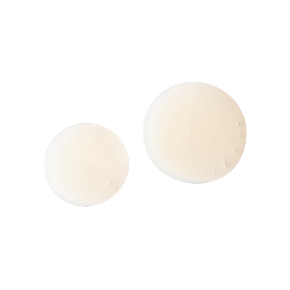 Two white circular gel samples of different sizes on a white background