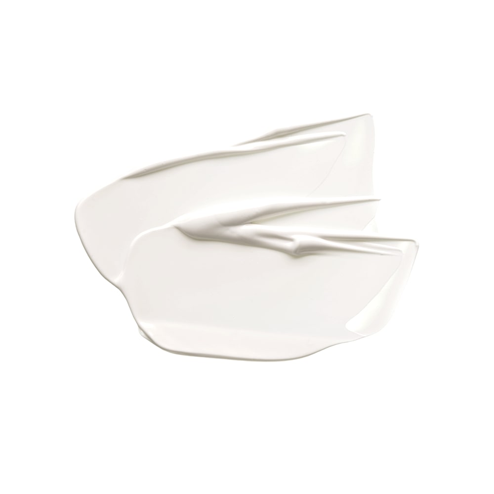 Smear of white cream or lotion on white background